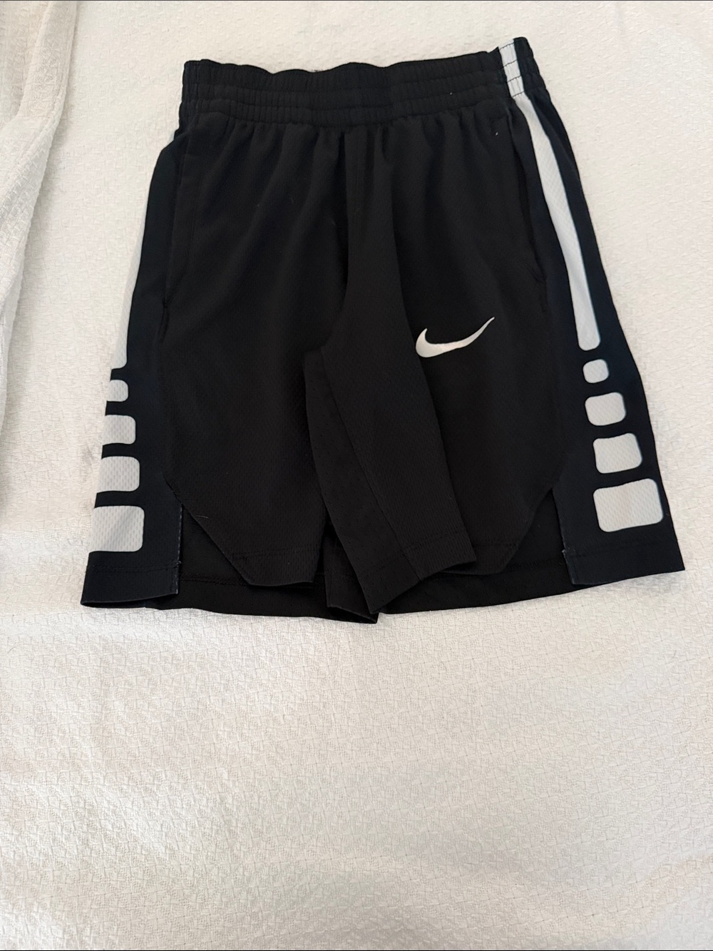 Nike Black Athletic Shorts with White Swoosh and Side Panels